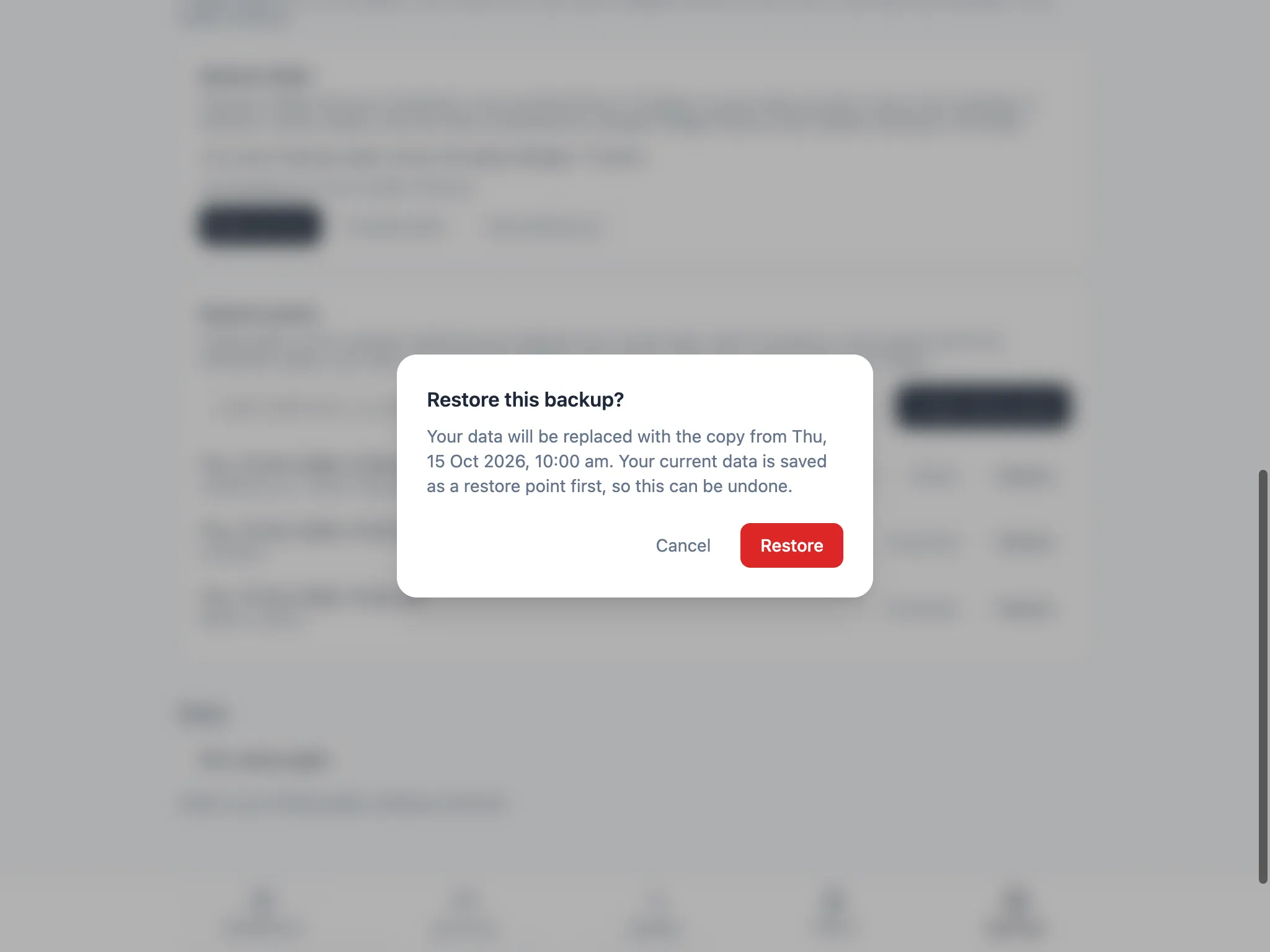 The restore confirmation dialog: “Your data will be replaced… Your current data is saved as a restore point first, so this can be undone.”